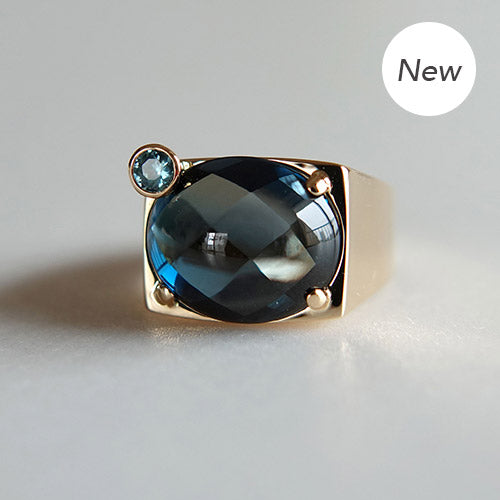 Blue topaz & zircon ring